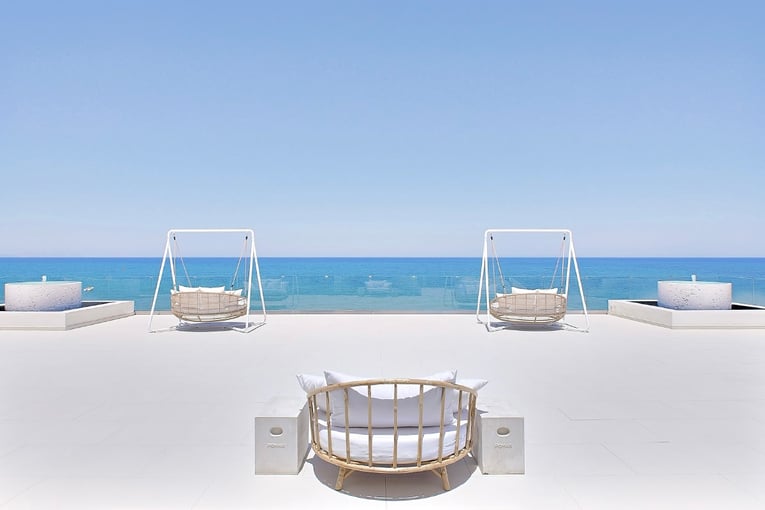 Grecotel Lux Me White Palace 22-lounge-area-al-fresco-in-sunny-crete-grecotel-white-palace-resort-33691