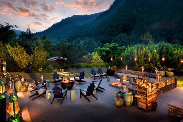 andBeyond Punakha River Lodge | Exclusive Tours Bhutan-Punakha-River-Lodge-Guest-Area-Fire-Pit_4-1